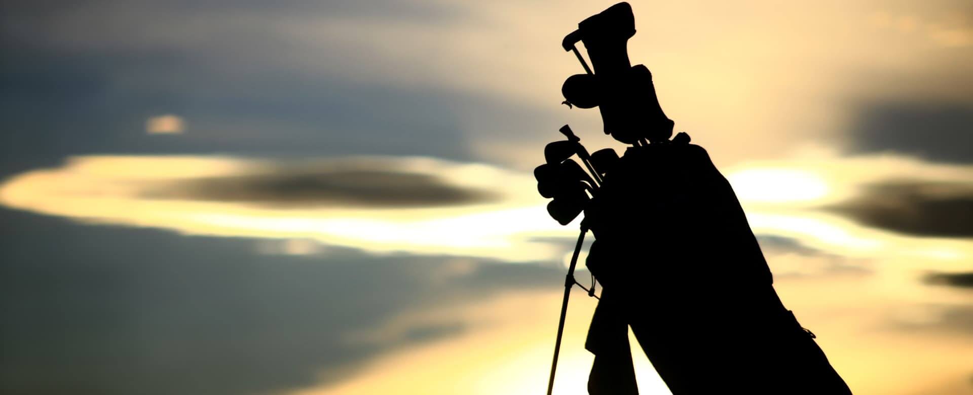 silhouette-of-golf-bag-at-sunset